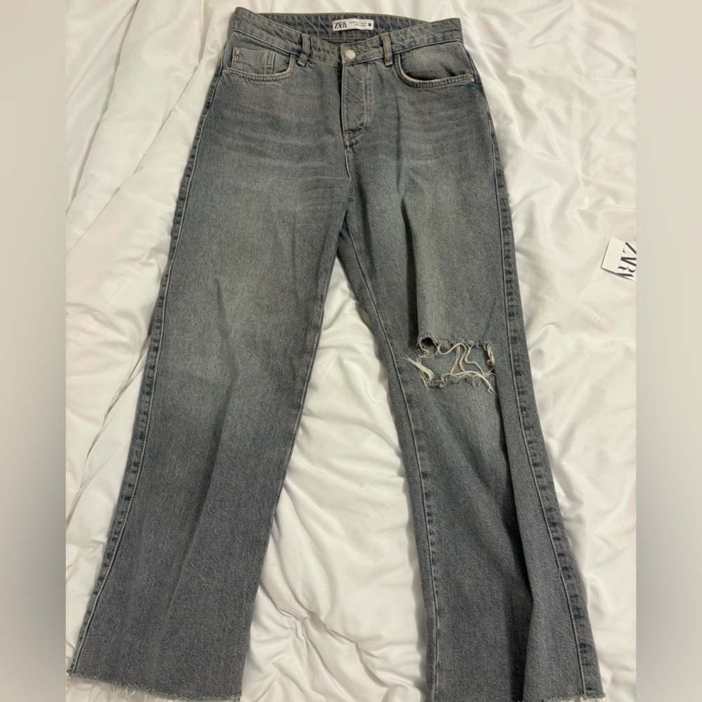 High waisted distressed grey jeans